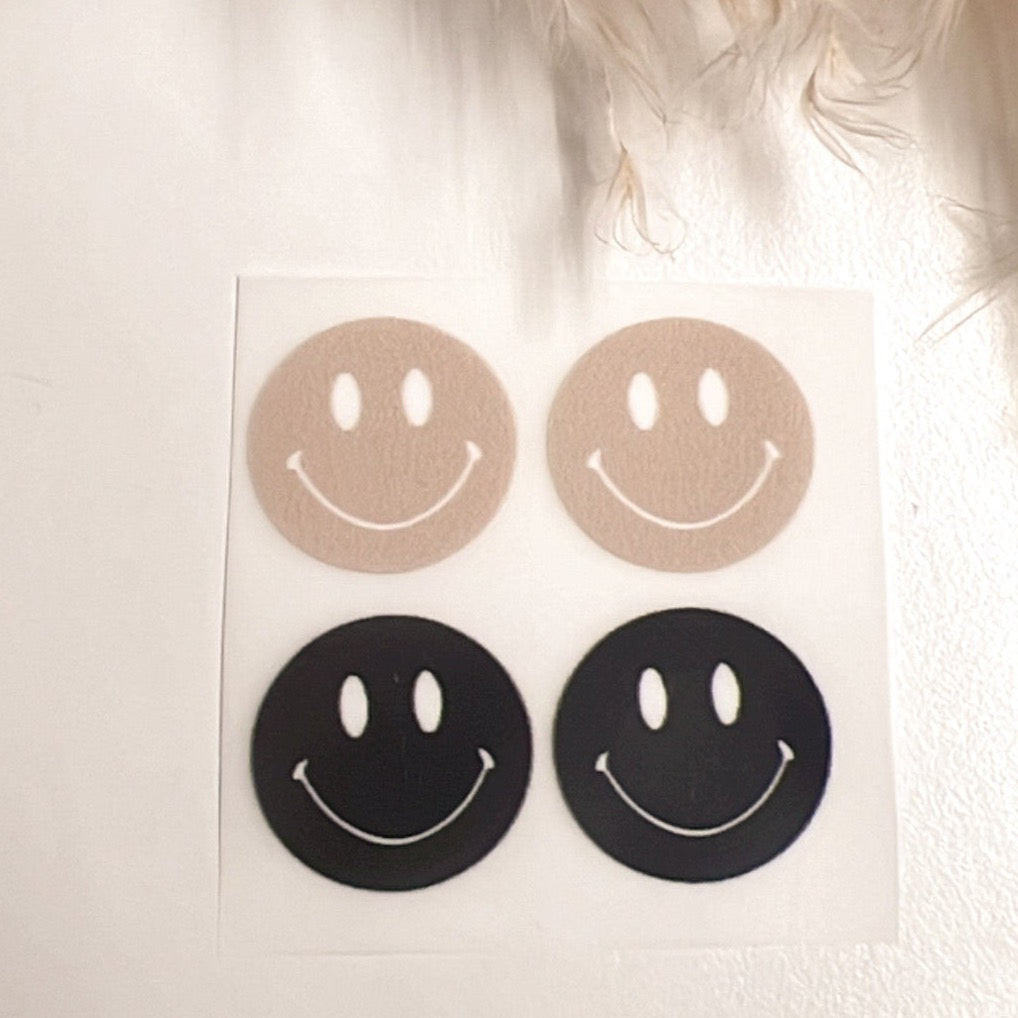 Bügelbild 4 Smileys je ca. 2 cm