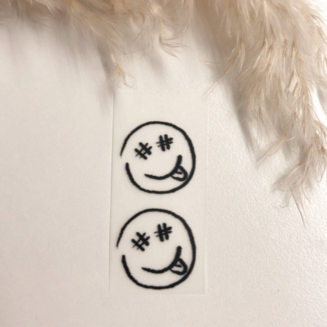 Bügelbild 2 Smileys je ca 2,2 cm